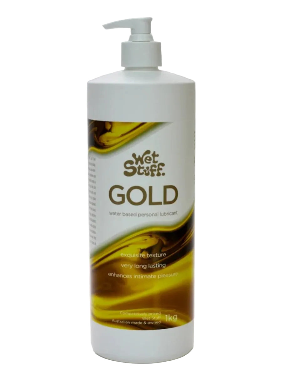 Retail packaging of Wet Stuff Gold water based lubricant in a 1kg pump bottle, showing gold and white design.