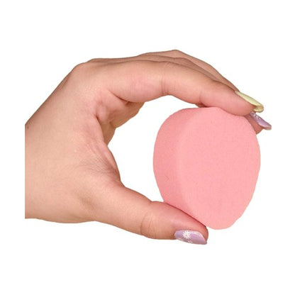Menstrual sponge held in hand size reference