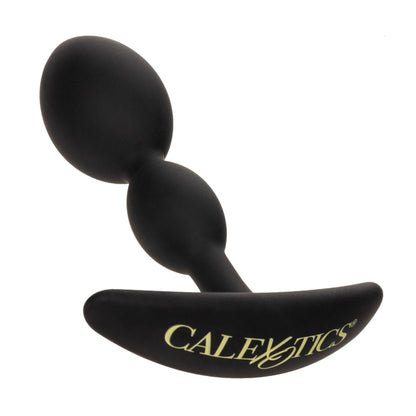 Angled view of teardrop-shaped anal plug showing dual bulb design