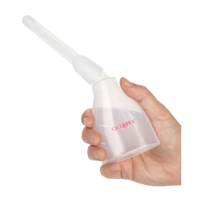 Douche system held in hand for size reference