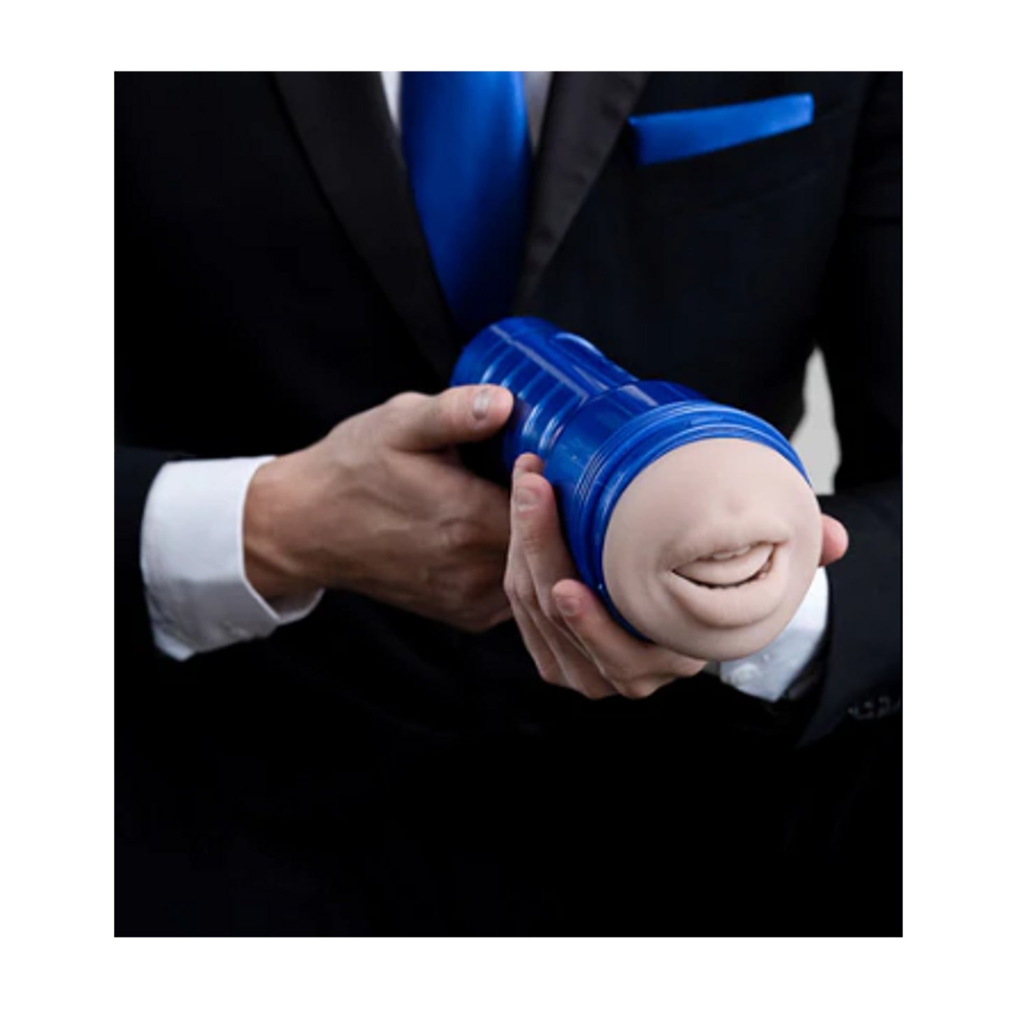 Male hands holding blue Fleshlight Boost Blow mouth masturbator