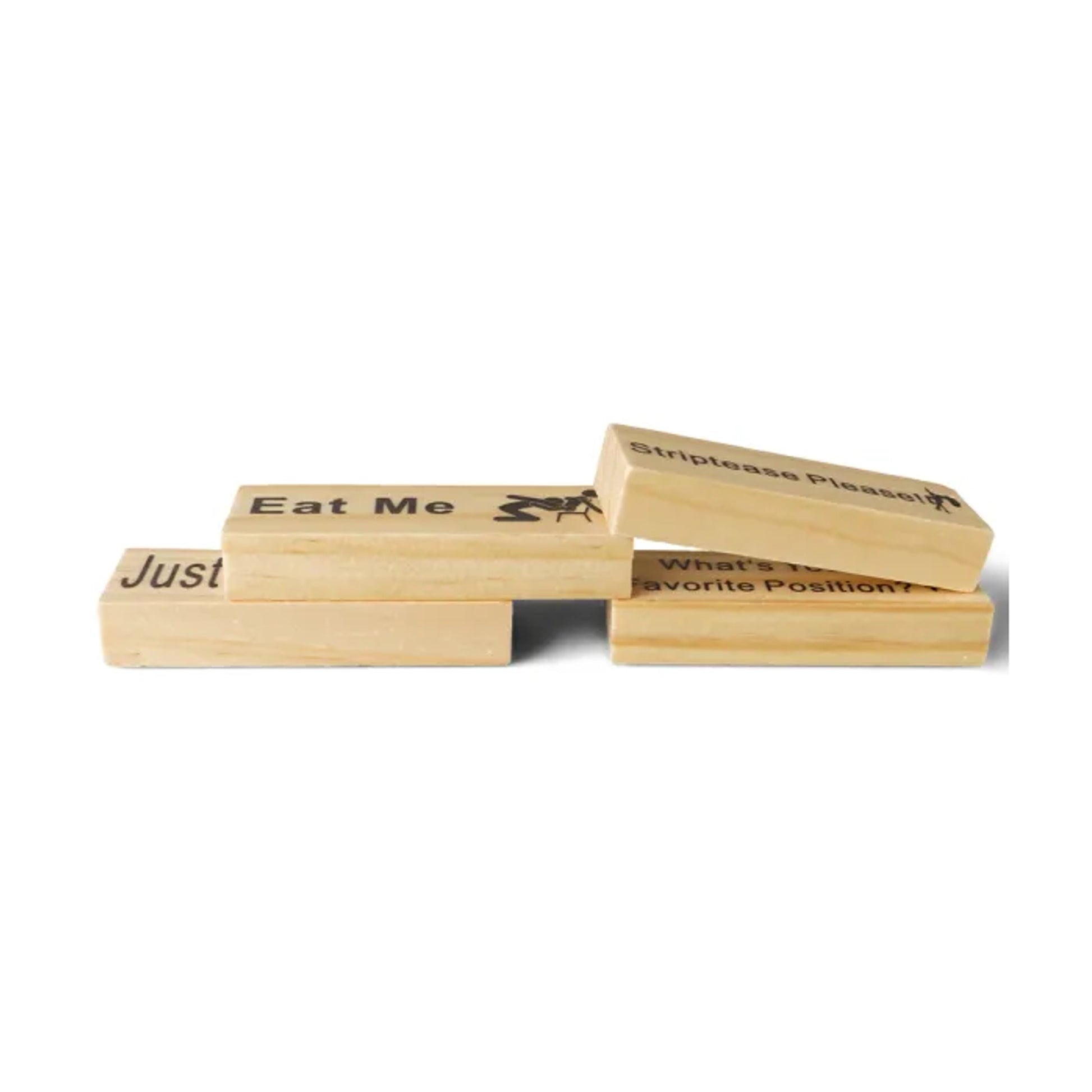 Close-up of wooden blocks with printed dares and tasks