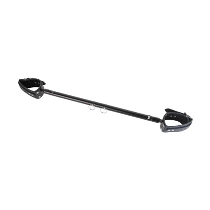 Angled view of spreader bar with pivoting cuff fittings 