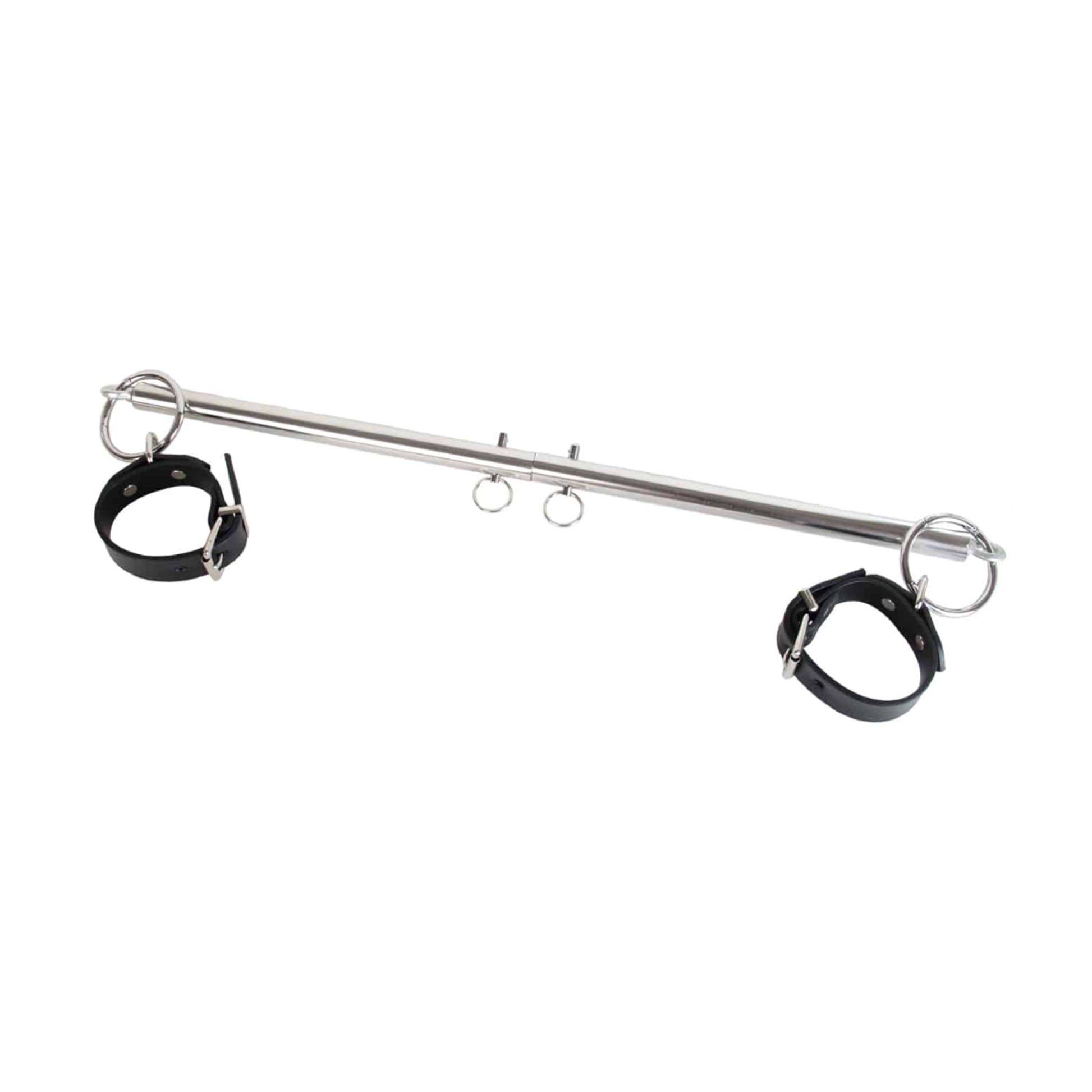 Angled view of chrome spreader bar with cuffs attached for display 