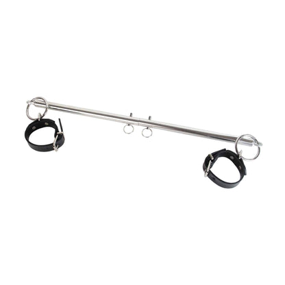 Angled view of chrome spreader bar with cuffs attached for display 