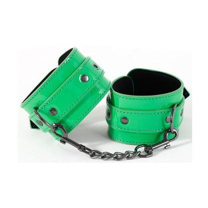 Close-up of green cuff with buckle and D-ring