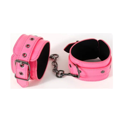 Hot pink faux leather handcuffs with removable chain
