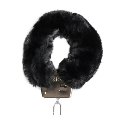 Close-up of leopard plush cuff with metal locking mechanism