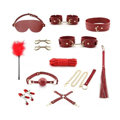 Wine red bondage accessory kit laid out flat