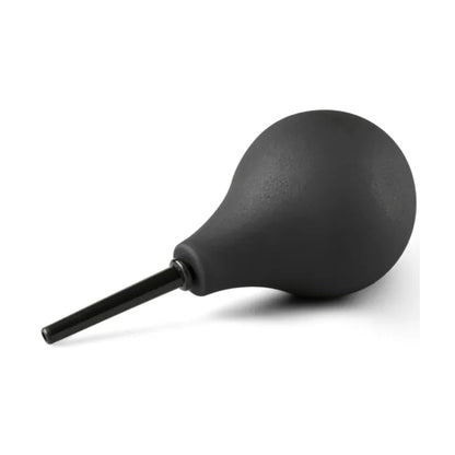 Angled side view of black douche showing nozzle profile