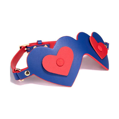 Angled view showing layered heart design and gold fittings