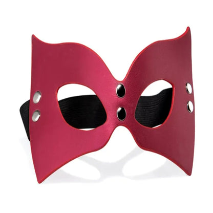 Front view of red Venetian mask with silver metal fittings