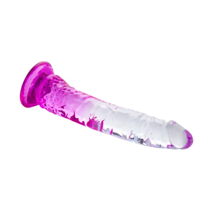Angled view of clear and purple ombre dildo with suction cup base