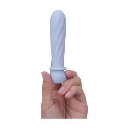 Purple swirl bullet held in fingertips for size scale