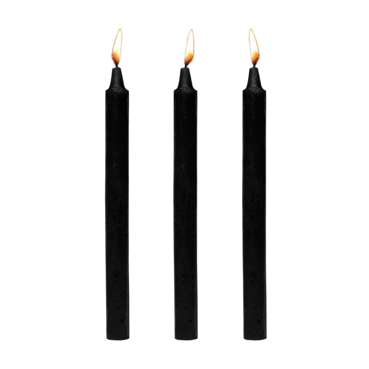 Three black drip candles standing upright with lit wicks