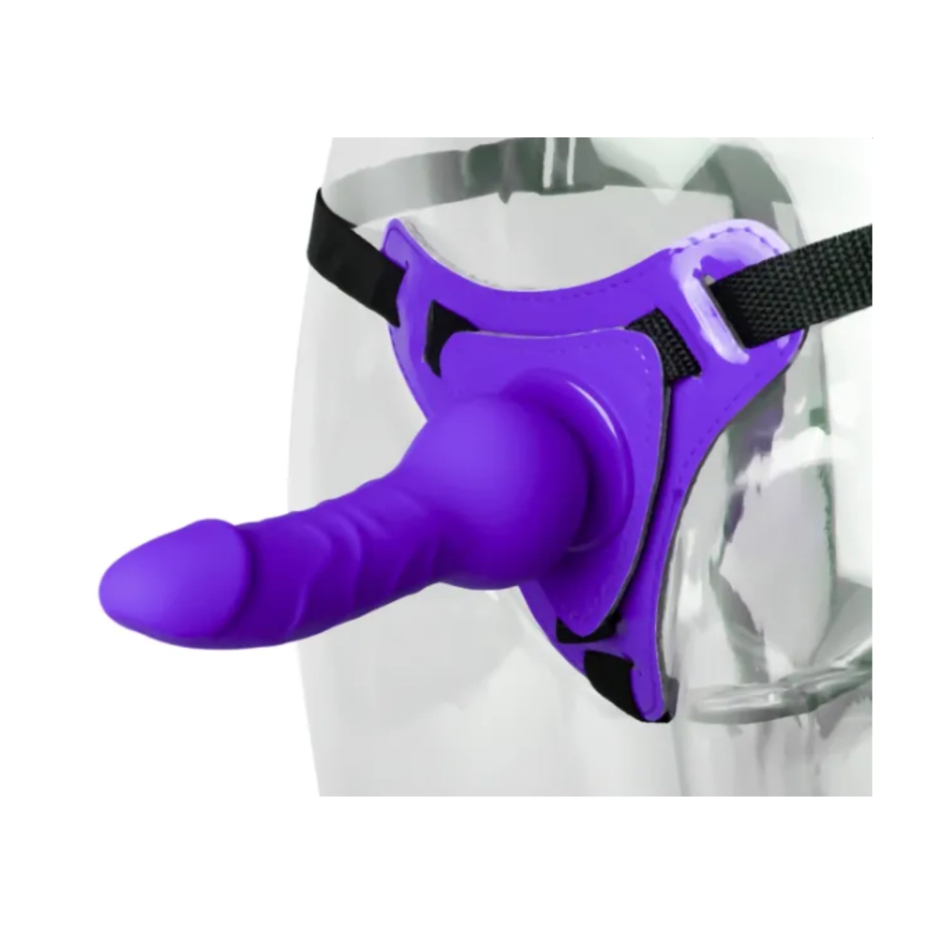Strap-on dildo worn on clear mannequin, angled front view
