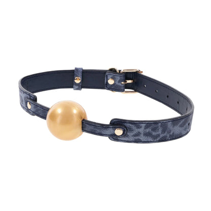 Left hand view showing adjustable strap and gold ball gag