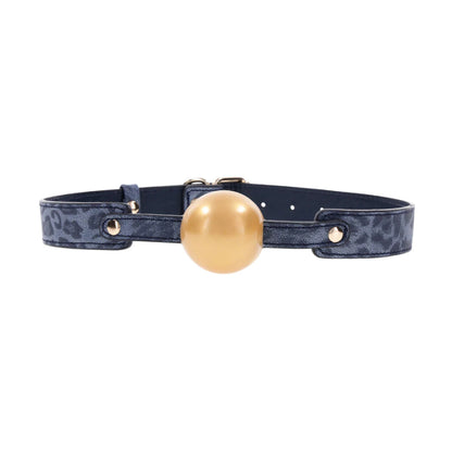 Front view showing gold ball and patterned strap detail