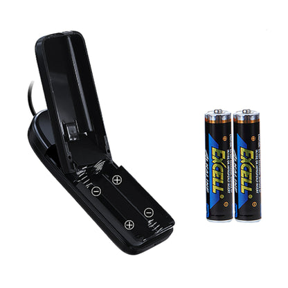 Open battery compartment with two AA batteries beside it