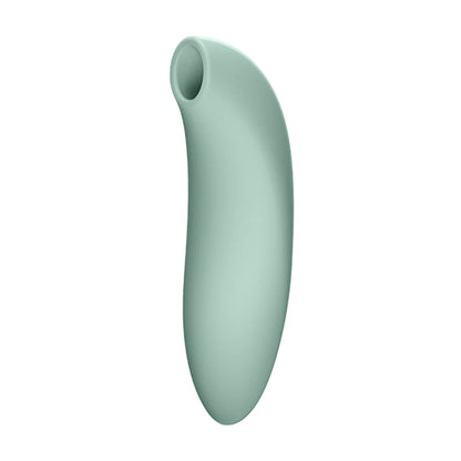 Side profile view showing curved stimulation nozzle
