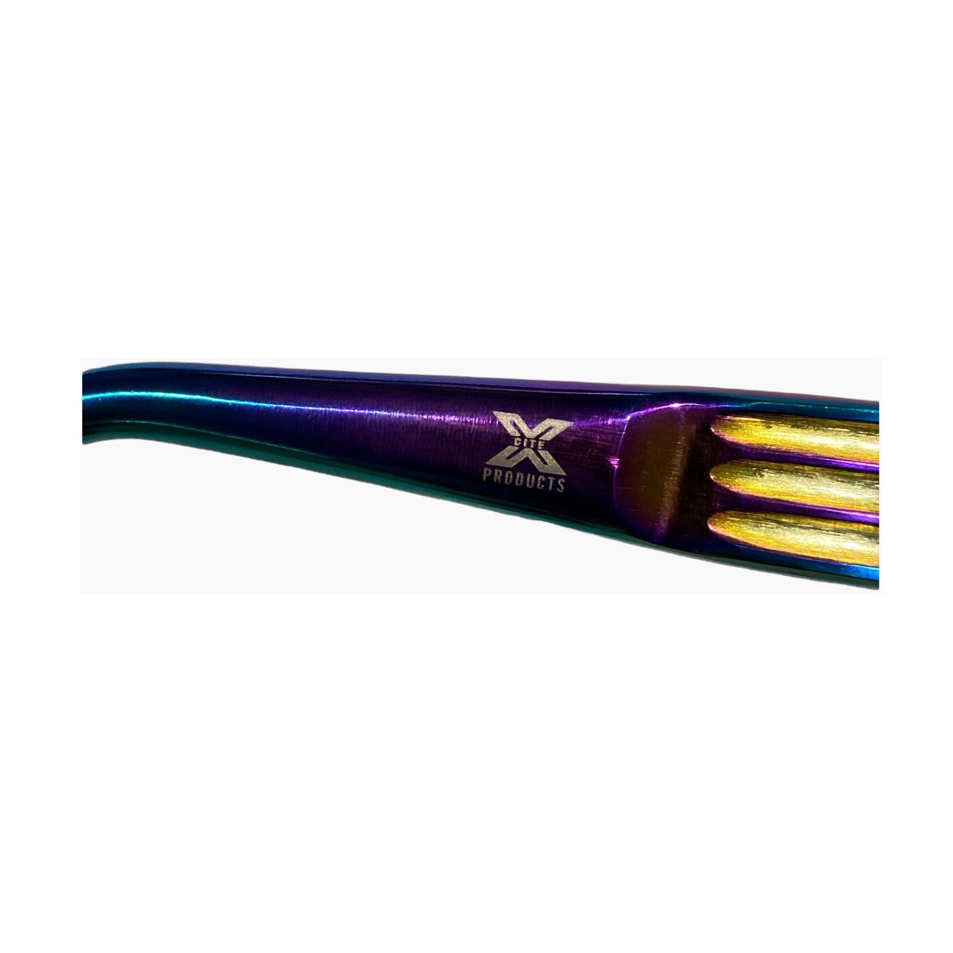 Close-up of the iridescent handle with Xcite Products logo