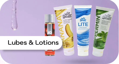 Collection of lubes and lotions with visible branding on a purple background